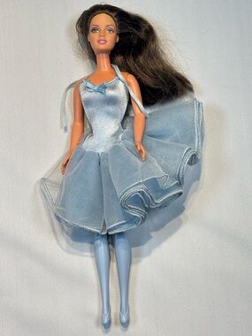 ballerina barbie wearing the 1987 Perfume Pretty Whitney Barbie Doll outfit